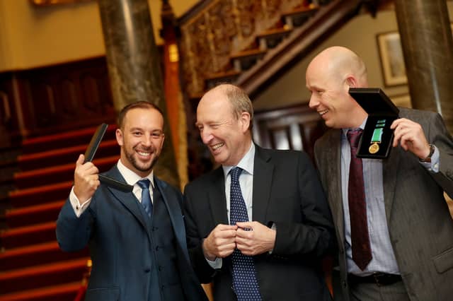 Davitt Walsh (left), with Minister for Transport, Tourism & Sport Shane Ross and Gary Robertson, a fellow Gold Medal winner, from Sligo.