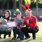 Iseult Ward (CEO & Co-Founder FoodCloud), Joe Smith (Lions Club Coordinator), Ellamay Melia (6) and Lughán Ó Riagáin (8).