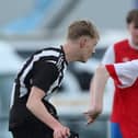 Tullamore Town's Ronan Guinan in action against St. Joseph's Jason Johnson Moore during Saturday FAI CUP Semi-Final