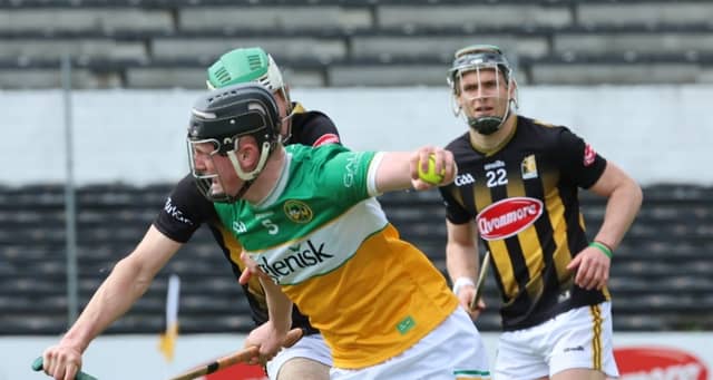 Andrew Hogan wins the ball ahead of Ruarc Sweeney. Picture: Ger Rogers