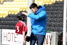 Paddy Deegan teaching the next generation at the launch of Cumann na MBunscol hurling league in Nowlan Park (Photo by Willie Dempsey)