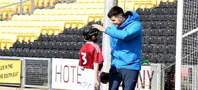 Paddy Deegan teaching the next generation at the launch of Cumann na MBunscol hurling league in Nowlan Park (Photo by Willie Dempsey)