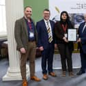 Fatima Memon collected her prize with teacher, James Shovlin, Senator Rónán Mullen, Iar‑Cheann Comhairle Seán Ó Fearghaíl, and parents Zaibunnissa and Fayaz Memon