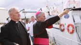 Fr Paddy O'Kane pictured with Bishop Lagan at the annual blessing of the boats ceremony in Greencastle in August 2009.