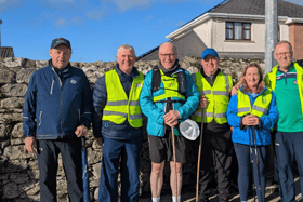 Niall Rochford (centre), the man behind the Cork2Cong Challenge, alongside John Kiely and supporters