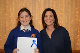 Fionnuala Griffin presents the award for AR Word Millionaire to Clara Johnston who read over 5 million words