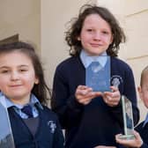 Lyla Flood, Lemmy Cullen Strain and Turlough McHugh who demonstrated their maths prowess and were honoured at the national Have You Got Maths Eyes photography awards in Dublin recently. Pic: John Ohle