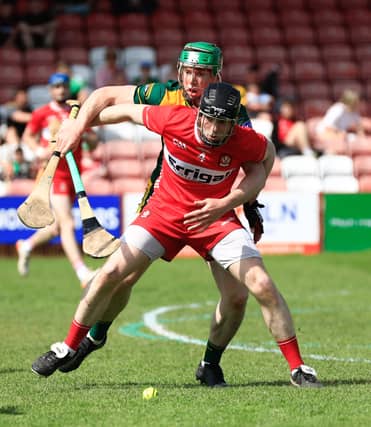Derry’s Cathair McGilligan in a tussle with Donegal’s Josh Cronolly McGee during their recent Christy Ring Cup clash at Celtic Park. (Photo - Tom Heaney, nwpresspics)
