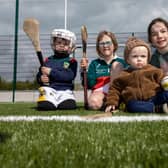 Fionn, Aoife and Páidí Maher with Sarah Quirke at the official opening of the St. Martins GAA Club new 3G pitch at Coon. Picture: Alf Harvey