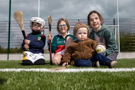 Fionn, Aoife and Páidí Maher with Sarah Quirke at the official opening of the St. Martins GAA Club new 3G pitch at Coon. Picture: Alf Harvey