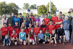 Kelly McGrory with Tir Chonaill AC coaches and athletes. Photos: Joe Boland (North West Newspix)