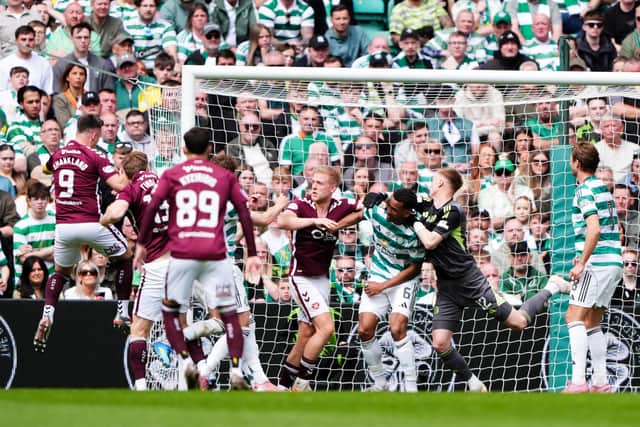 There was a surprise in the Hearts line-up as PFA Scotland Player of the Year Claudio Braga started on the bench.