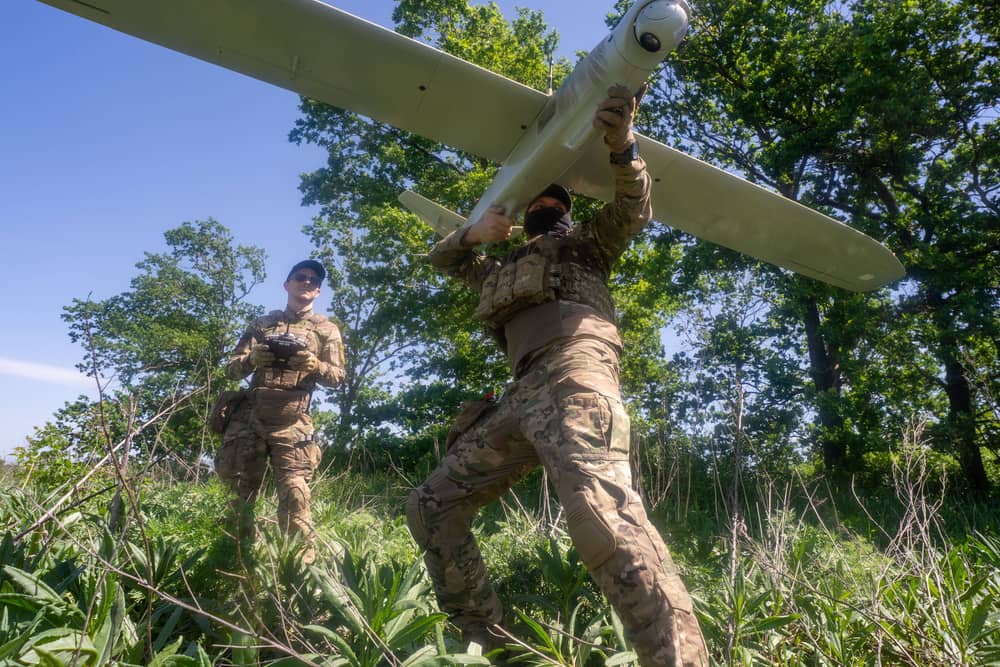 Ukrainian servicemen prepare a drone