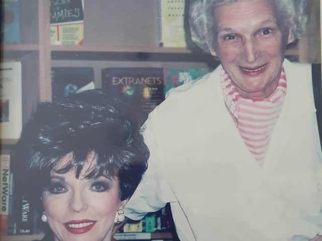 Lillian with actor Joan Collins.