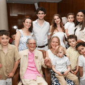 Lillian O'Moore with her grandchildren and great grandchildren at her 100th birthday celebrations in the City Hotel.