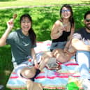 Enjoying the sunshine in the People's Park this week were Tanita Phosachan, City Centre, Talita Salsa, Raheen and Marcus Lima, Raheen | PICTURE: Adrian Butler