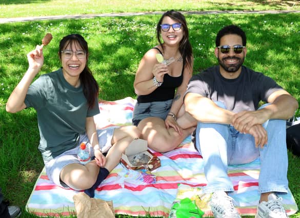 Enjoying the sunshine in the People's Park this week were Tanita Phosachan, City Centre, Talita Salsa, Raheen and Marcus Lima, Raheen | PICTURE: Adrian Butler
