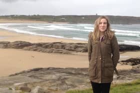 Natalie McNally near a beach