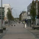 Pictured only a short time after the street was pedestrianised in the 2000s, granite seating was a feature of Bedford Row