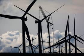 View of a wind farm and cloudy skies