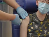 A jab being delivered