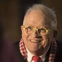 Headshot of David Hockney smiling