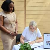 Mayor of Galway, Helen Ogbu, and Deputy Mayor of Galway, Josie Forde writing their condolences.