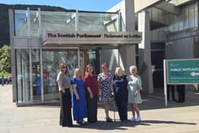 Women outside the Scottish parliament building in Edinburgh