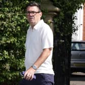 Andy Burnham walking outside