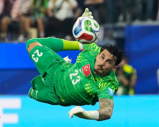 Turkey goalkeeper Ugurcan Cakir makes a save against the USA