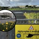 The helicopter landing area; inset, UHG