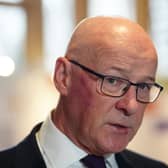 Headshot of John Swinney speaking