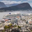 cruise ship Iona docked in the town of Ålesund, Norway