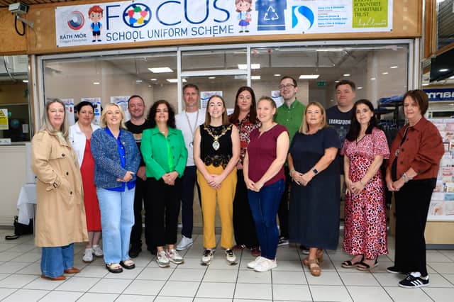 Mayor Grace Uí Niallais with representatives from the Anti-Poverty Task & Finish Group, and volunteers at the official opening of the Focus School Uniform Outlet at Ráth Mór.