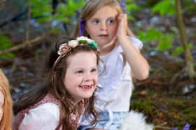 Tuireann Whelan (5) from Faha enjoying a magical seanchaí session with Bachelor In Trouble Tom Coffey 