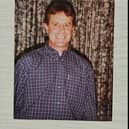 A family photo of John Gillies smiling