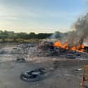 The remains of the Moygashel bonfire, which had a replica mosque placed on top