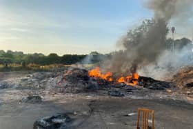 The remains of the Moygashel bonfire, which had a replica mosque placed on top
