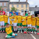 A win-win: The Moville Celtic U-12 Braves celebrate their league title triumph, which came in the middle of the town's best festival ever.
