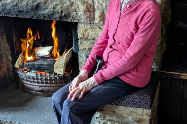 Catherine by her fireside