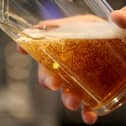 Someone pulls a lovely pint