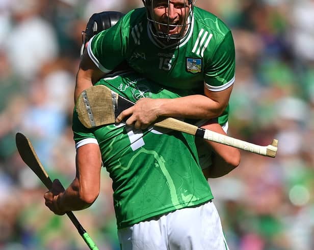 Peter Casey celebrates Limerick's latest All-Ireland triumph with Gearóid Hegarty | PICTURE: Stephen McCarthy/Sportsfile