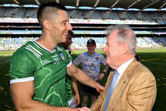 Dan Morrissey of Limerick is congratulated by businessman JP McManus during the GAA Hurling All-Ireland Senior Championship Final match between Galway and Limerick at Croke Park in Dublin
Picture: Stephen McCarthy/Sportsfile