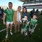 Limerick captain Cian Lynch, left, Businessman JP McManus, Limerick psychologist Caroline Currid, with her children Cathal, age 9, right, and Liam, age 7, and the Liam MacCarthy Cup after during the GAA Hurling All-Ireland Senior Championship Final match between Galway and Limerick at Croke Park in Dublin                                  Picture: Stephen McCarthy/Sportsfile