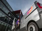 A man next to a Mitie van