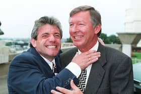 Newcastle boss Kevin Keegan (left) gets to grips with Manchester United manager Alex Ferguson as they meet at Wembley