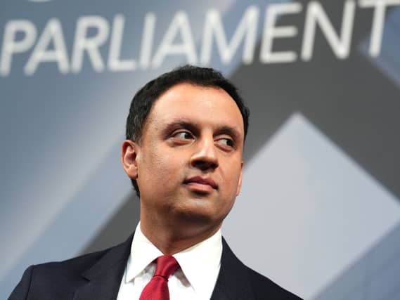 Anas Sarwar looking to his left
