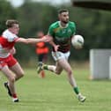 Killian Farrell (Ardagh Moydow) gets past the challenge of Colin Gilna (Abbeylara) during Friday's ​Peter Hanley Motors Longford Senior Football Championship Group A Round 2 encounter at C & D Devine Park