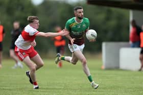 Killian Farrell (Ardagh Moydow) gets past the challenge of Colin Gilna (Abbeylara) during Friday's ​Peter Hanley Motors Longford Senior Football Championship Group A Round 2 encounter at C & D Devine Park