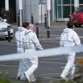 Forensic investigators at Fairgreen Shopping Centre in Carlow on Monday (Niall Carson/PA)